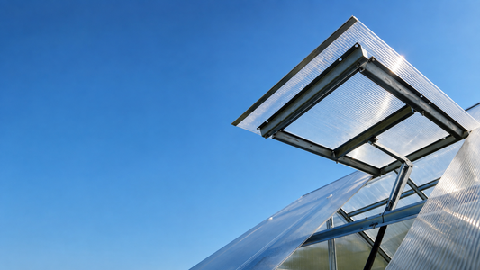 Close-up of translucent twin-wall polycarbonate panels installed on a durable backyard greenhouse